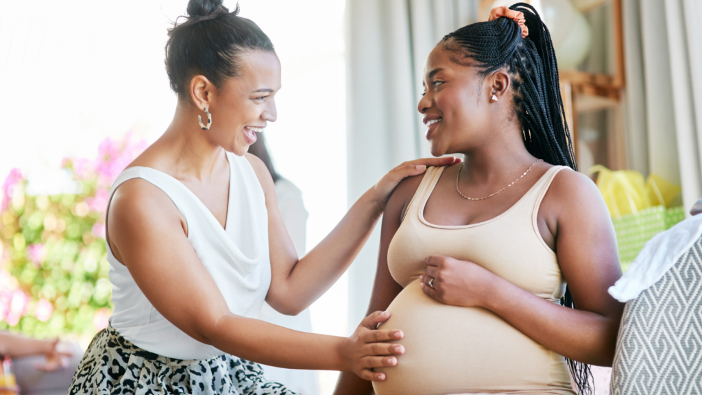 Pregnant woman and midwife.